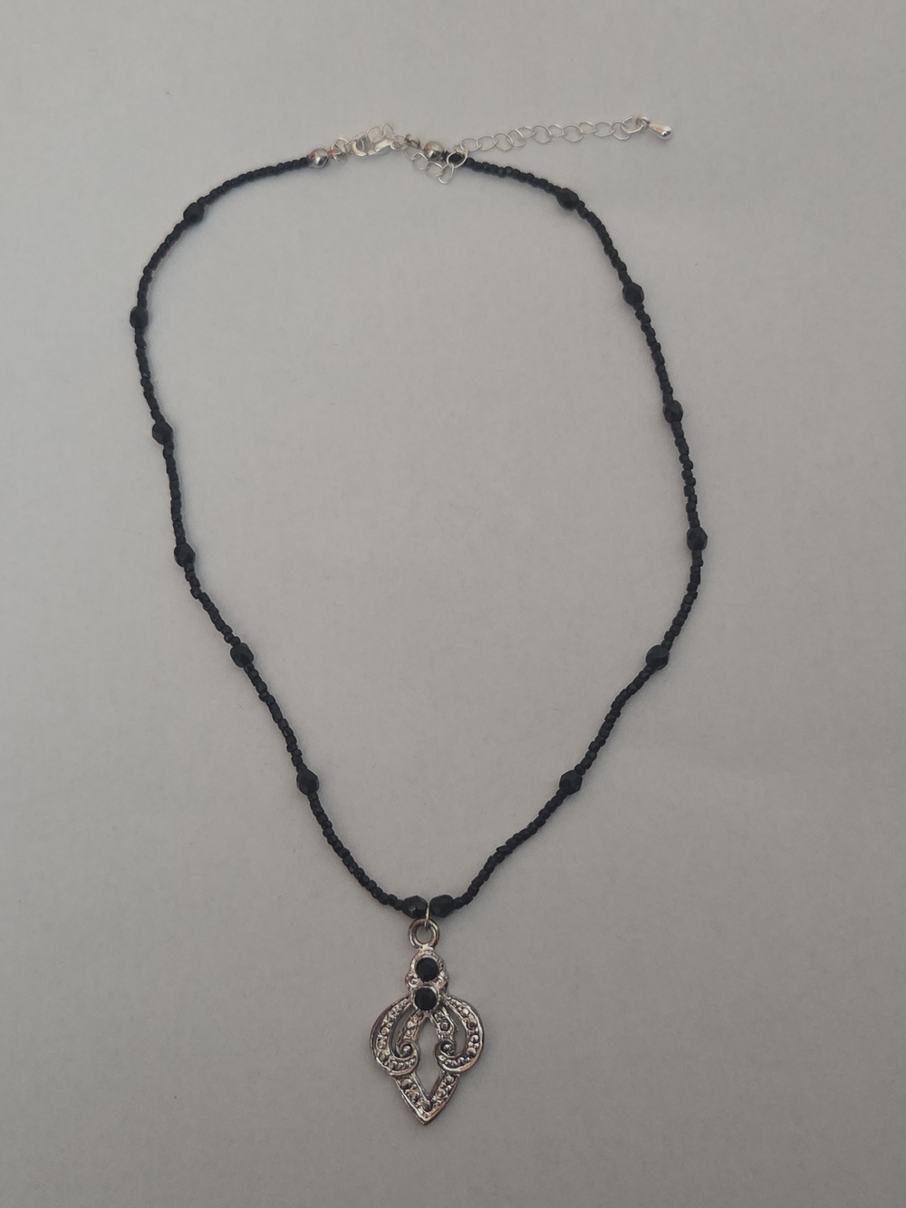Handmade Black Beaded Necklace with Silver Pendant